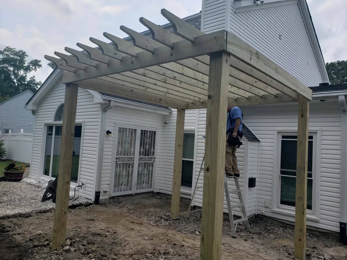 Pergola being built off the back of a Norfolk home