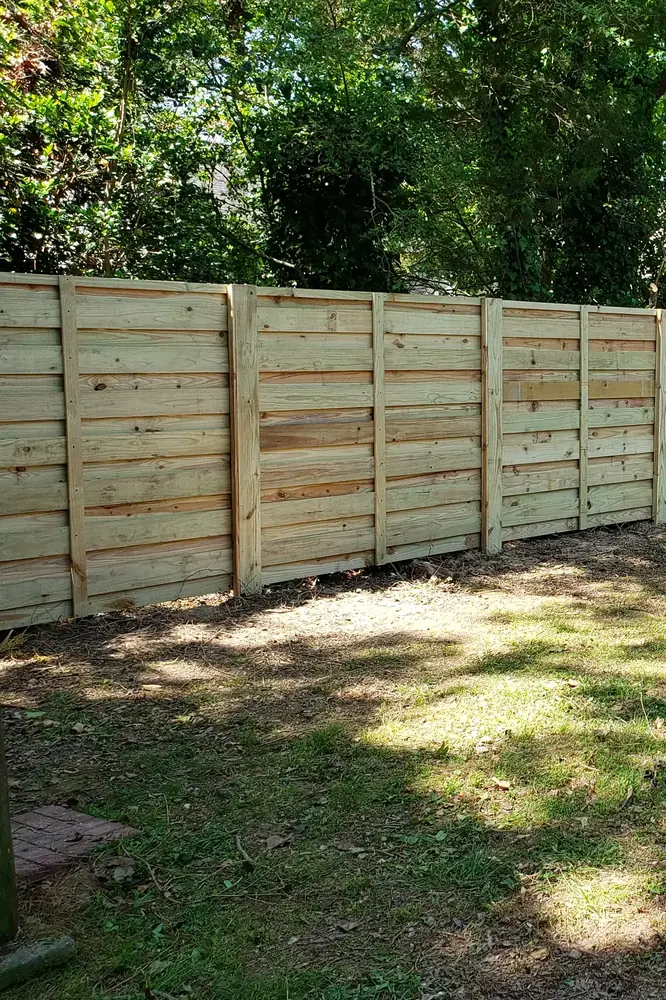 Horizontal wood privacy fence built by VB Fences