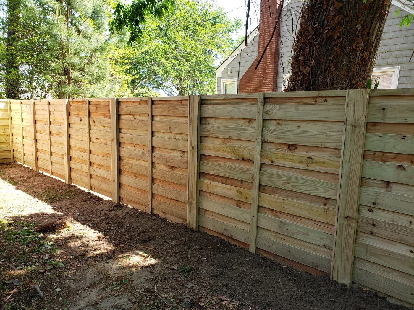 Senior Chief build: board-on-board full privacy fence, overlapped boards